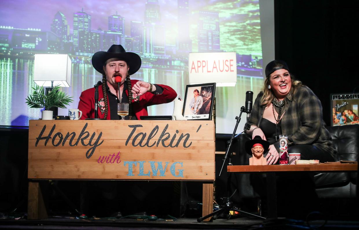 Tyler Lance Walker Gill, left, host of the "Honky Talkin' with TLWG" show, talks with Nashville musician Steph Maguire after her performance at The Whirling Tiger in Louisville. Feb 6, 2024