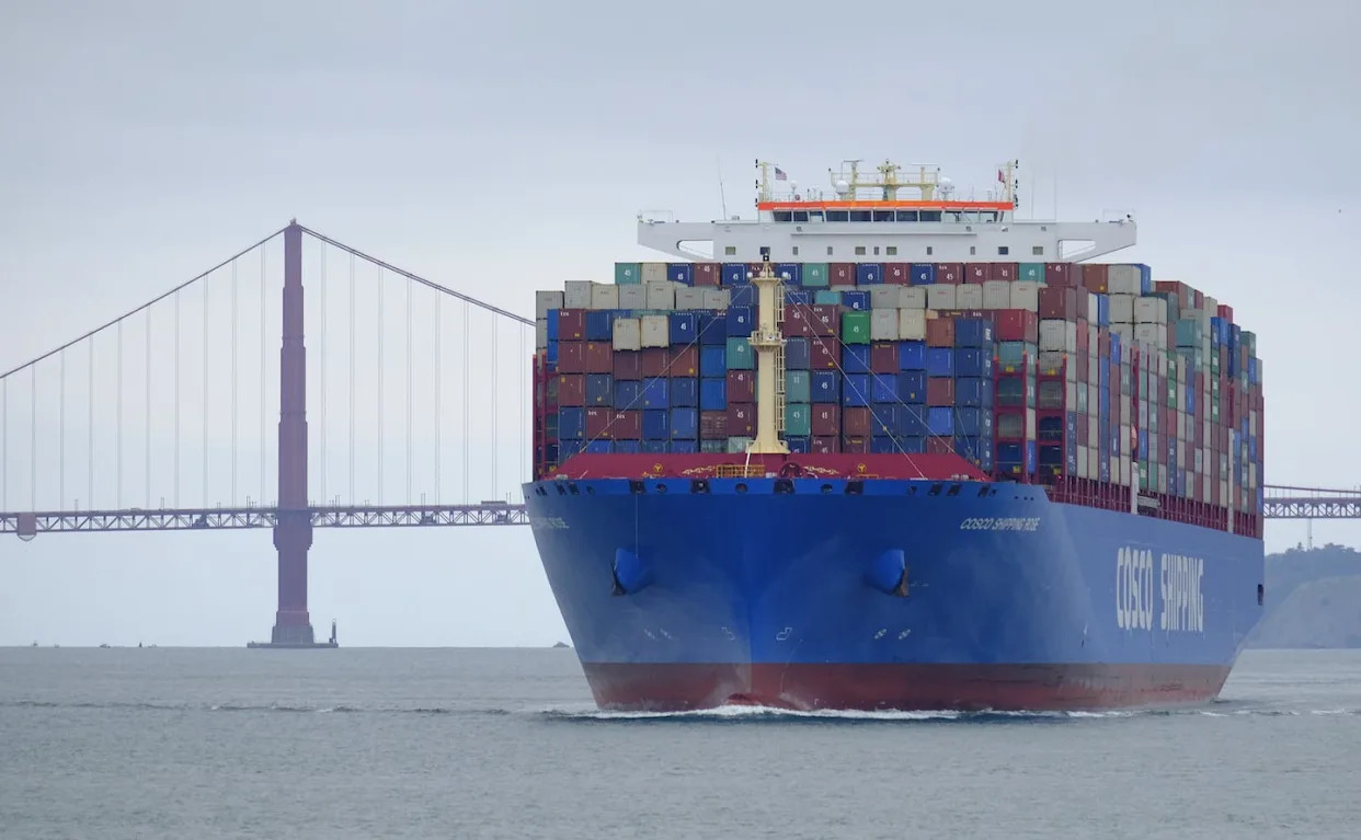 A shipping container passes the Golden Gate Bridge in San Francisco bound for Oakland, Calif. <a href="https://newsroom.ap.org/detail/YETop10Stories/ad61b1dbff7949bd85e18a5468873823/photo?Query=China%20AND%20shipping&mediaType=photo&sortBy=&dateRange=Anytime&totalCount=285&currentItemNo=44" rel="nofollow noopener" target="_blank" data-ylk="slk:AP Images/Eric Risberg;elm:context_link;itc:0" class="link rapid-noclick-resp">AP Images/Eric Risberg</a>