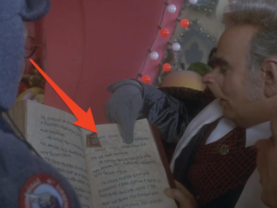 arrow pointing to mayor's book in how the grinch stole christmas