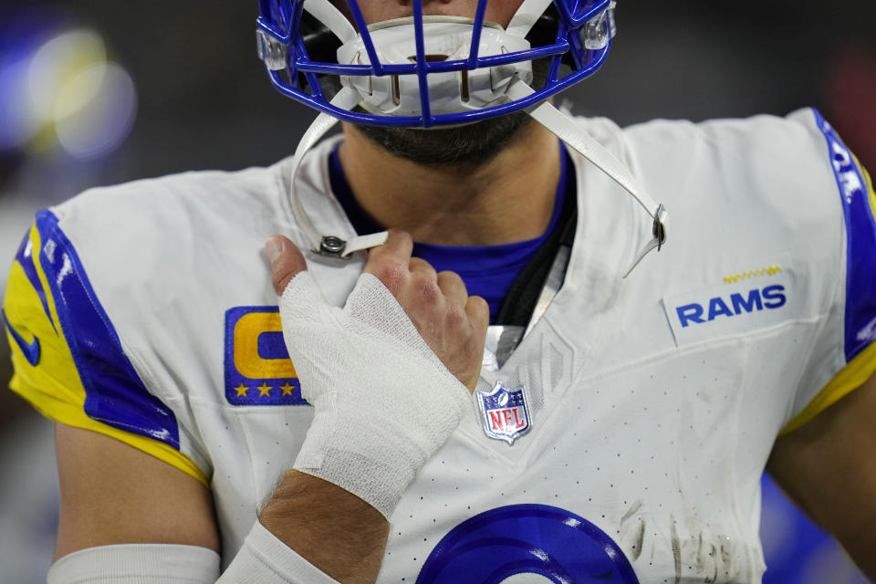 Los Angeles Rams quarterback Matthew Stafford wears a bandage on his throwing hand during the second half of an NFL football game against the Dallas Cowboys Sunday, Oct. 29, 2023, in Arlington, Texas. (AP Photo/Julio Cortez)