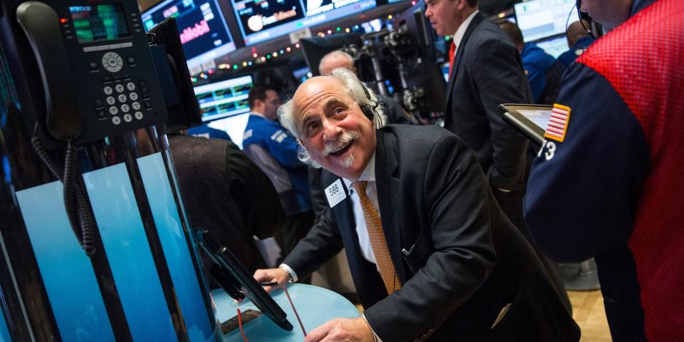 smiling stock exchange trader happy