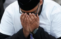 <p>A Musllm prays at a makeshift memorial a day after a van struck multiple people along a major intersection in north Toronto, Ontario, Canada, April 24, 2018. (Photo: Carlo Allegri/Reuters) </p>