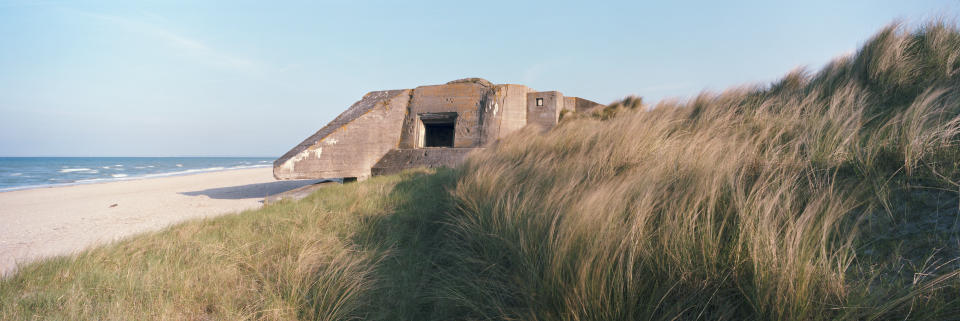 A former German defense bunker lies in Marram Grass along a stretch of coastline that was known as 'Utah Beach' during the June 6, 1944 D-Day Beach landings on April 30, 2019 in Audouville-la-Hubert, on the Normandy coast, France. (Photo: Dan Kitwood/Getty Images)