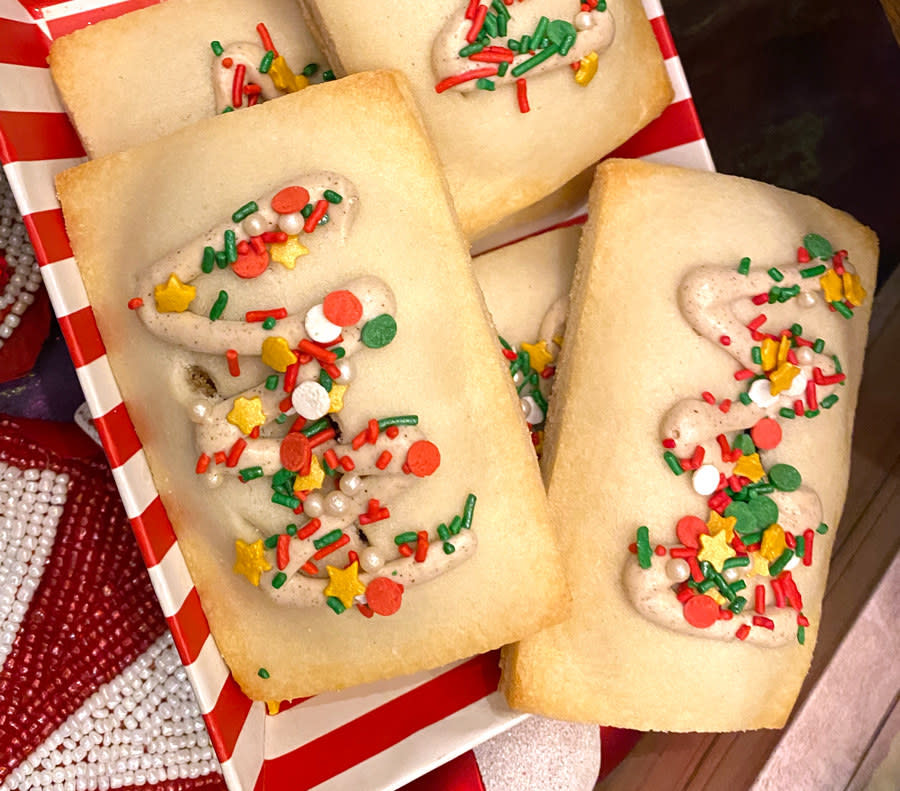 a pop tart like dessert topped with sprinkles and cinnamon drizzle