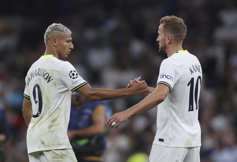 Tottenham's Richarlison, left, and Tottenham's Harry Kane celebrates their victory in the Champions League soccer match between Tottenham Hotspur and Olympique de Marseille at Tottenham Hotspur stadium, in London, England, Wednesday, Sept. 7, 2022. (AP Photo/Ian Walton)