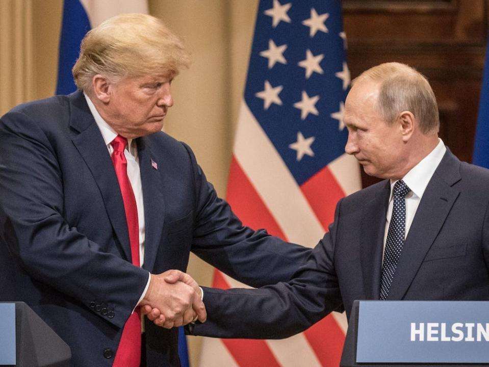 trump putin handshake