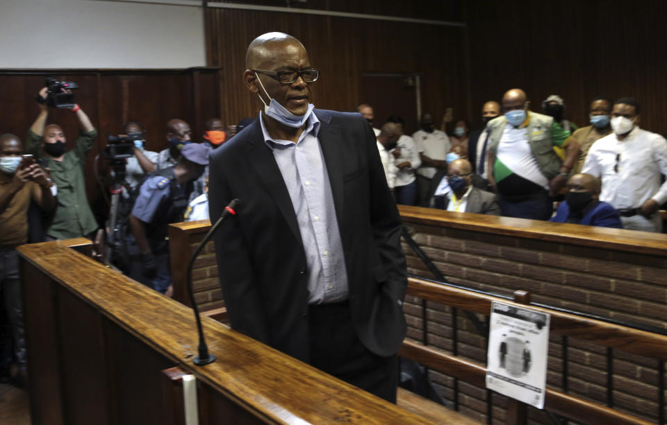 African National Congress secretary general Ace Magashule appears for a bail hearing inside the magistrates court in Bloemfontein, South Africa, Friday, Nov. 13, 2020. Magashule is charged in connection with the looting of $13.8 million when he was premier of the Free State province from 2009 until 2018. (AP Photo)