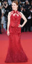 <p>Moore arrived at the premiere of <em>Ismael's Ghosts</em> in a red hot custom Givenchy Haute Couture textured gown with sheer and feathered embellisments and sparkling Chopard jewelry.</p>