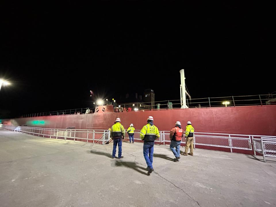Sailors on the Edwin H. Gott and engineers from the U.S. Army Corps of Engineers dock the freighter as it makes the season's first trip through the Soo Locks on March 25, 2023.