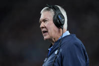 North Carolina head coach Mack Brown talks to his players in the first half of an NCAA college football game against South Carolina, Saturday, Sept. 2, 2023, in Charlotte, N.C. (AP Photo/Erik Verduzco)