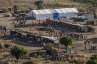 A general view of Um Rakuba refugee camp in Qadarif, eastern Sudan, Monday, Nov. 23, 2020. Tens of thousands of people have fled a conflict in Ethiopia for Sudan, sometimes so quickly they had to leave family behind. There is not enough to feed them in the remote area of southern Sudan that they rushed to. (AP Photo/Nariman El-Mofty)