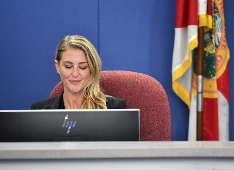 Sarasota County School Board Member Bridget Ziegler listens to public comments Tuesday evening, Dec. 12, 2023, after her fellow School Board members approved a resolution calling on her to resign.