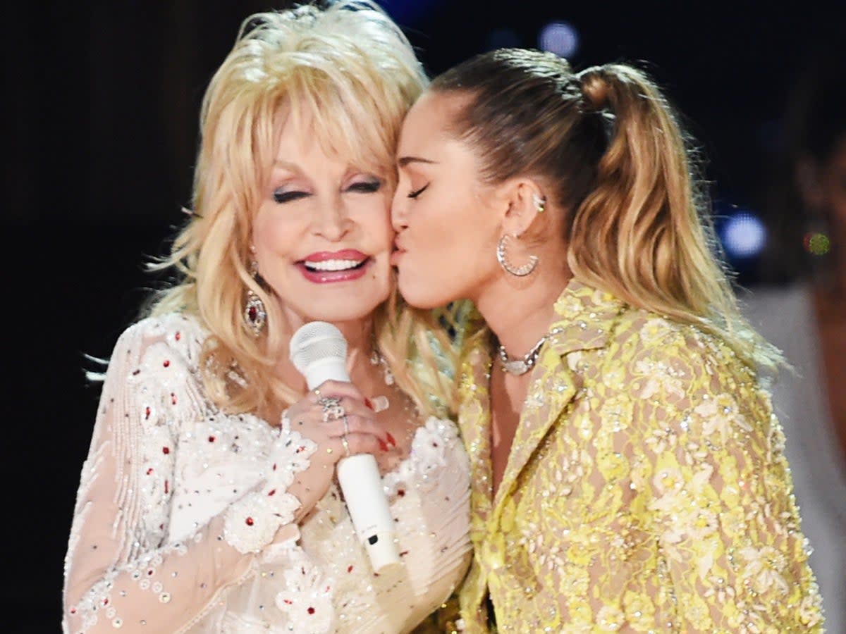 ‘She’s always done what she had to do’: Dolly Parton with goddaughter Miley Cyrus (Getty Images for The Recording Academy)