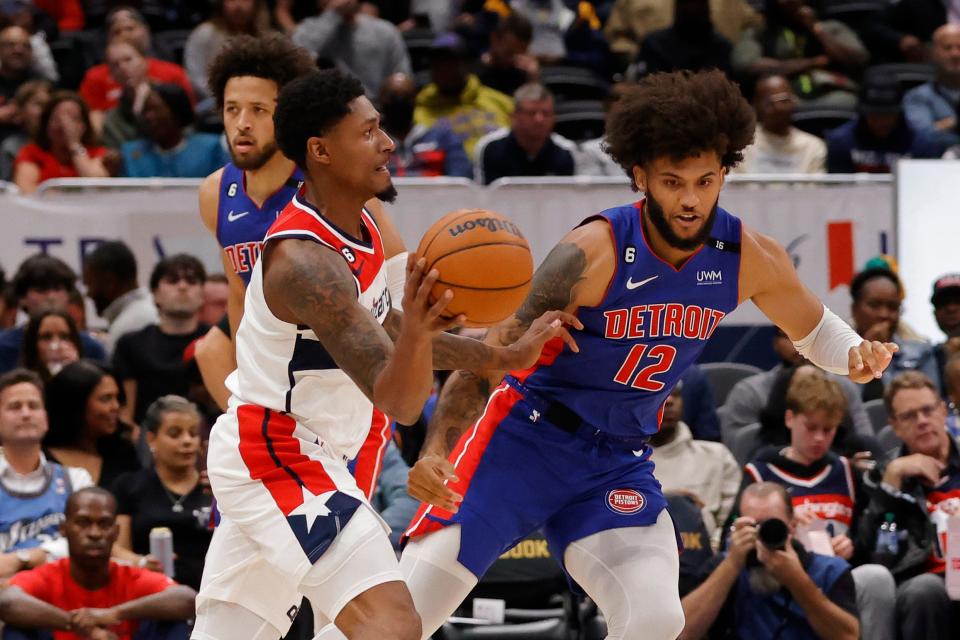 Wizards guard Bradley Beal passes the ball as Pistons forward Isaiah Livers defends during the first half on Tuesday, Oct. 25, 2022, in Washington.