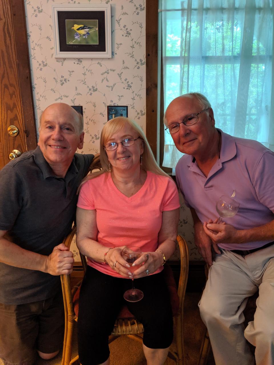 Dennis Sidoti (left) and Richard Silver's (right) first meeting in Rhode Island, with their sister Roberta in the middle.