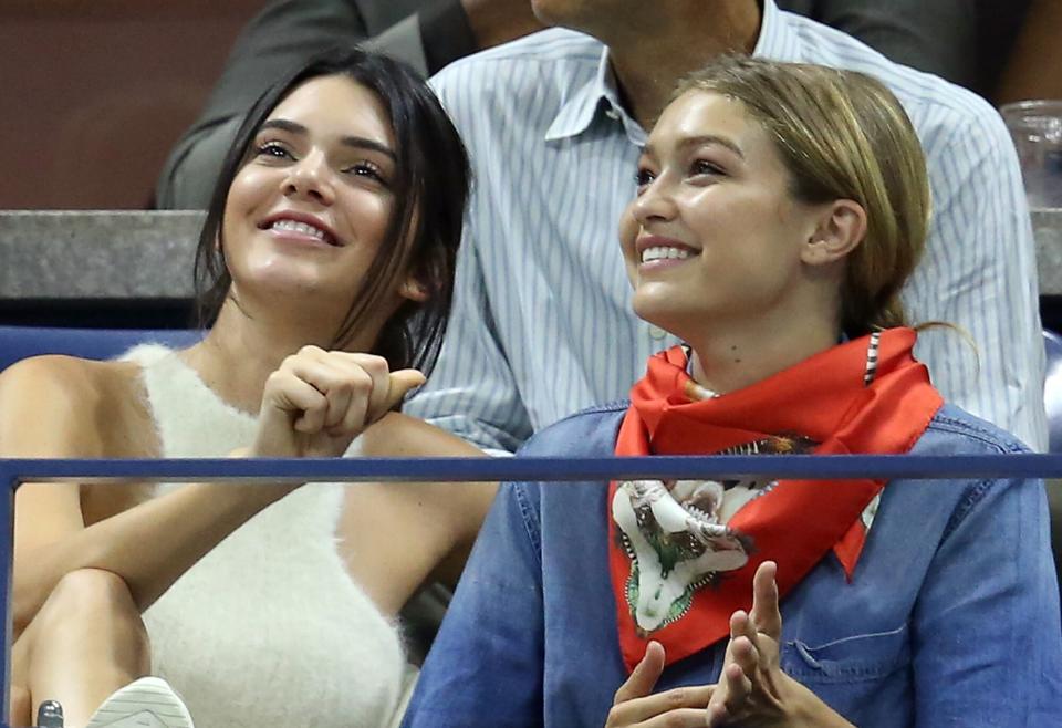 Kendall Jenner and Gigi Hadid attend the Women's Singles Quarterfinals match between Serena Williams of the United States and Venus Williams of the United States on Day Nine of the 2015 US Open at the USTA Billie Jean King National Tennis Center on September 8, 2015 in the Flushing neighborhood of the Queens borough of New York City