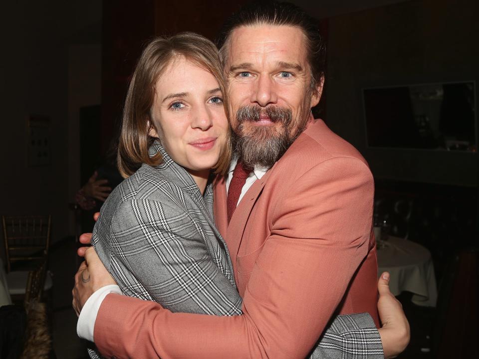 Maya Hawke hugging Ethan Hawke