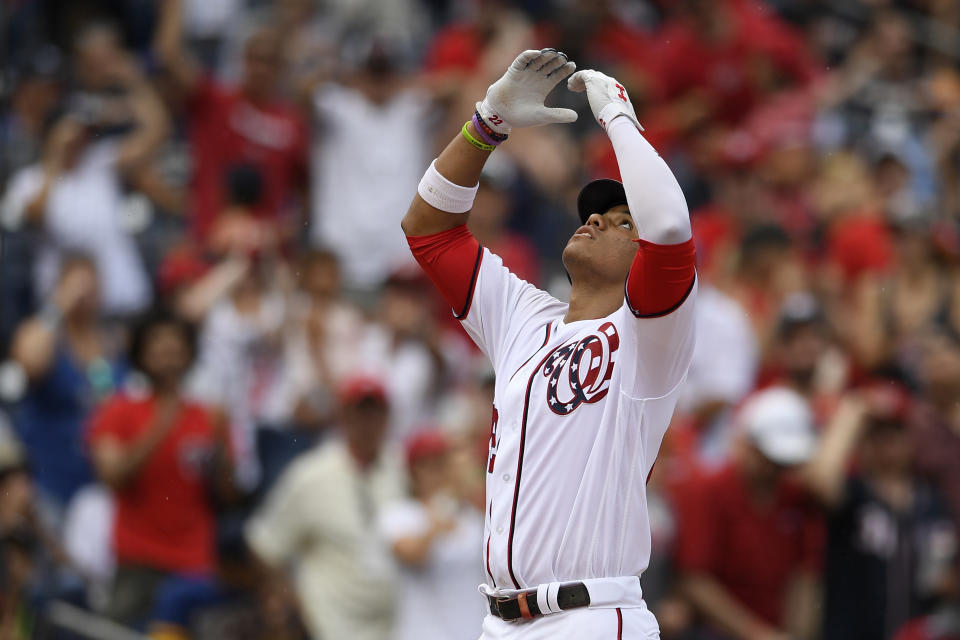 Washington Nationals' Juan Soto celebrates his home run during the third inning of a baseball game against the Milwaukee Brewers, Sunday, Aug. 18, 2019, in Washington. (AP Photo/Nick Wass)