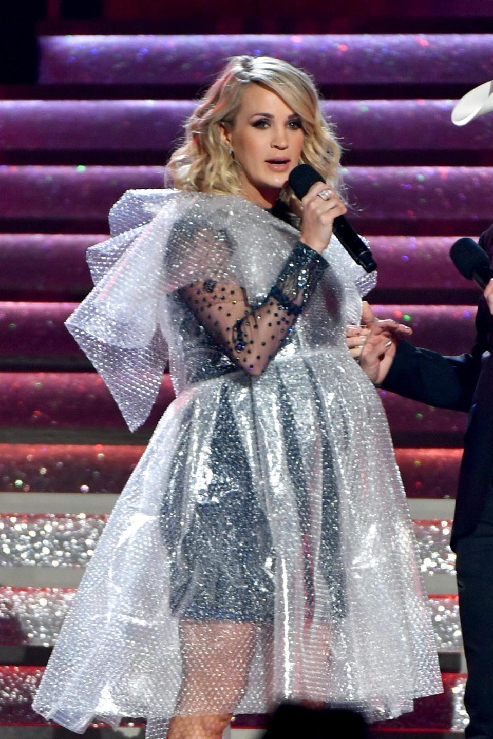 Carrie Underwood donned a bubble dress mid show to make light of her accident. (Getty Images)