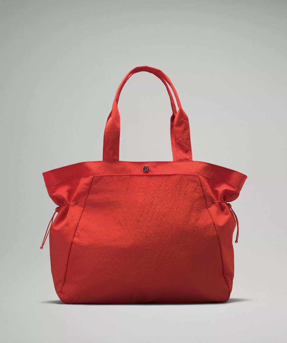 Side-Cinch Shopper Bag 18L in solar orange (photo via Lululemon)