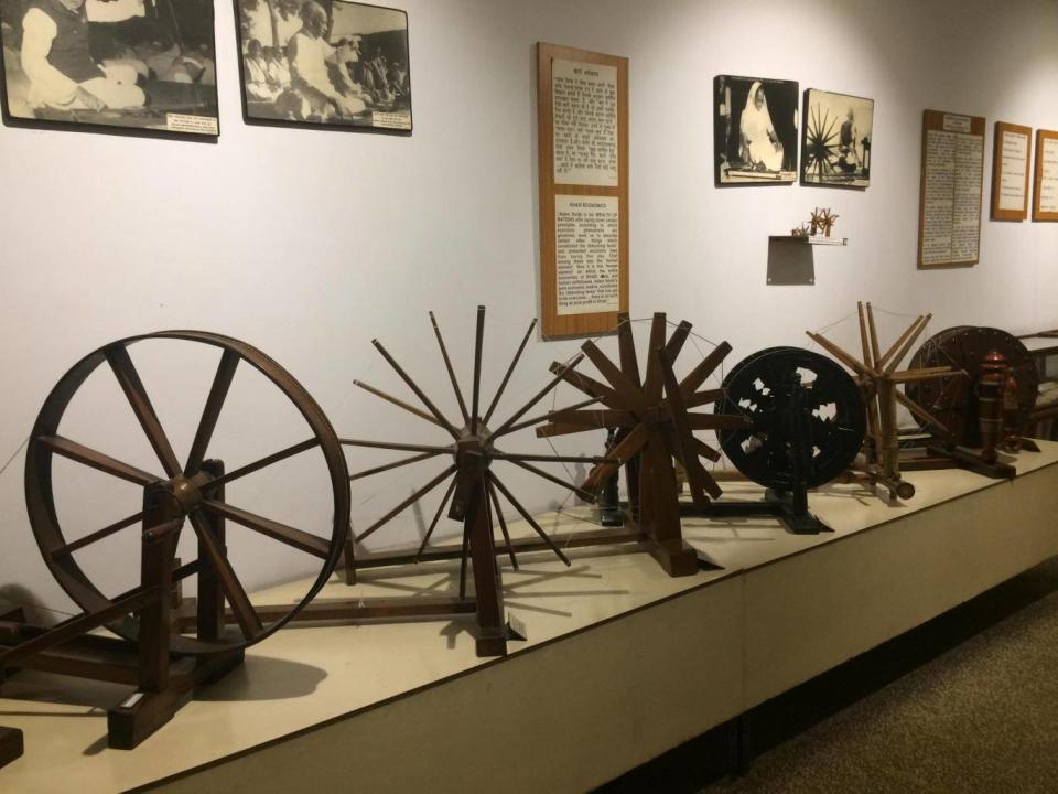 A selection of spinning wheels at the Charkha Museum (Tamara Hinson)