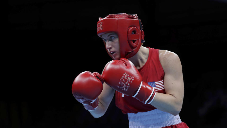 Virginia Fuchs of United States competes against Irismar Cardozo of Venezuela during the first round of their women's fly, 51 kg, boxing semifinal match at the Pan American Games in Lima, Peru, Tuesday, July 30, 2019. (AP Photo/Fernando Llano)