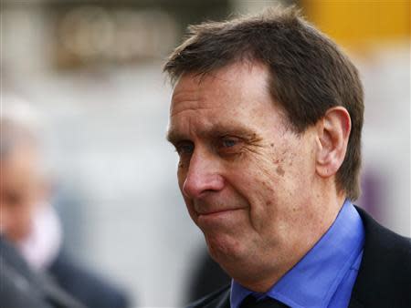 Clive Goodman, the former royal editor of the News of the World, arrives at the Old Bailey in central London March 17, 2014. REUTERS/Andrew Winning