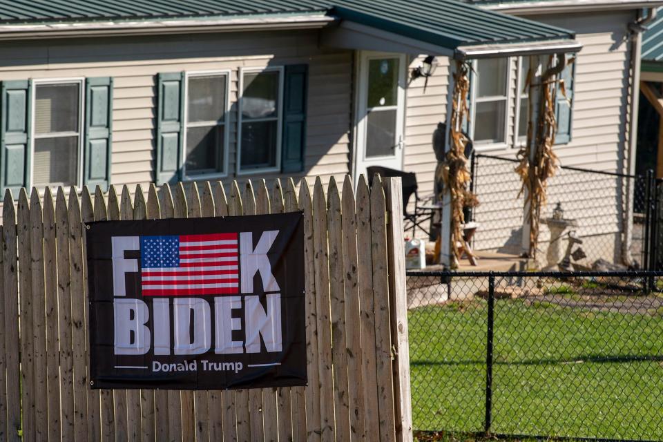 A sign on a home on Route 74 south of Red Lion displays displeasure with President Biden.