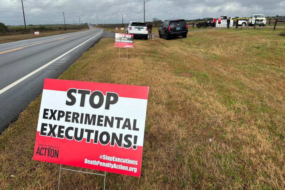 Anti-death penalty signs placed by activists along the road heading to Holman Correctional Facility in Atmore, Alabama before Kenneth Eugene Smith’s execution (Copyright 2024 The Associated Press. All rights reserved.)