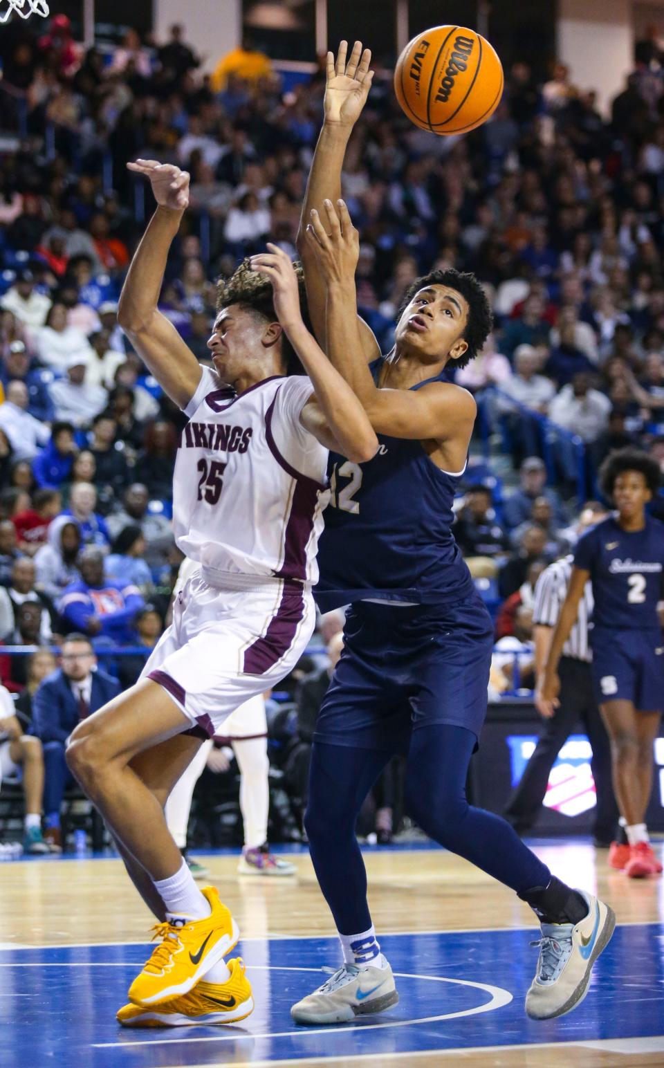 St. Elizabeth's Aiden Tobiason (left) and Salesianum's Justin Hinds clash in the first half of the Sals' 65-51 win in a DIAA state tournament semifinal at the Bob Carpenter Center, Thursday, March 7, 2024.