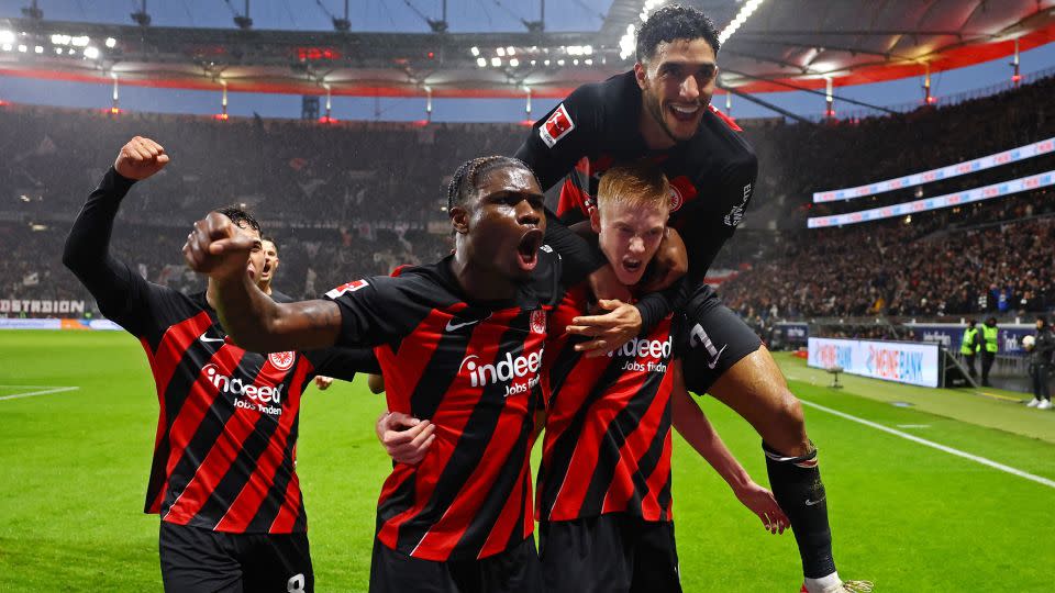 Hugo Larsson celebrates with Eric Junior Dina Ebimbe and Omar Marmoush after scoring Eintracht Frankfurt's third goal - Kai Pfaffenbach/Reuters