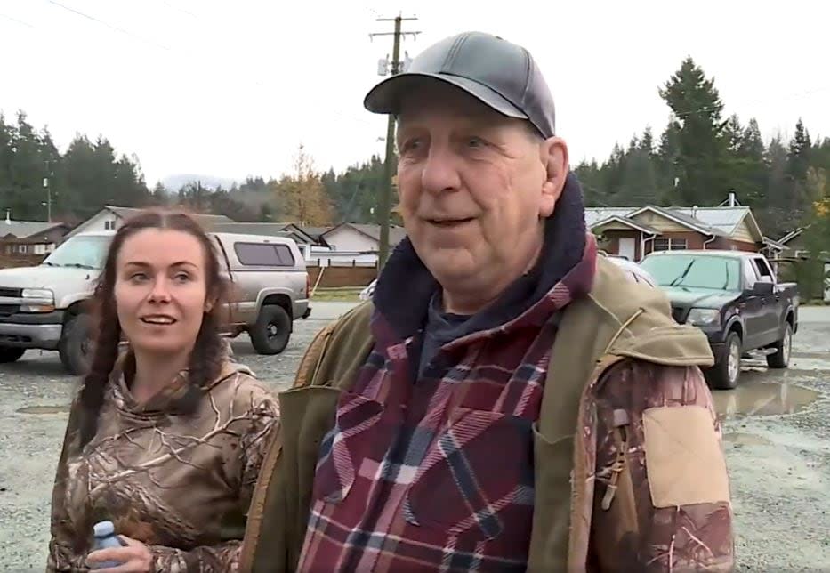 Ashlee Cosman and her father Willy John after they were rescued. (Dean Stoltz/CHEK News - image credit)