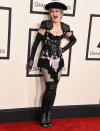 <p>Never too old for fishnets, a corset and thigh-high boots. <i>(Photo by Steve Granitz/WireImage)</i></p>