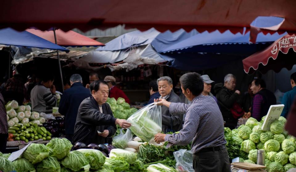 China inflation tame, frees central bank to further ease trade war impact on economy