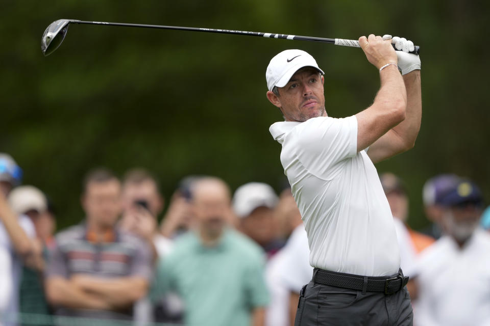 Rory McIlroy, of Northern Ireland, watches his tee shot on the third hole first round of the Wells Fargo Championship golf tournament at the Quail Hollow Club Thursday, May 9, 2024, in Charlotte, N.C. (AP Photo/Chris Carlson)