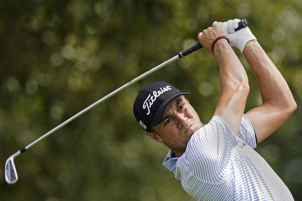 Justin Thomas hits from the tee on the third hole during second-round play in the Tour Championship golf tournament at East Lake Golf Club, Friday, Sept. 3, 2021, in Atlanta. (AP Photo/Brynn Anderson)