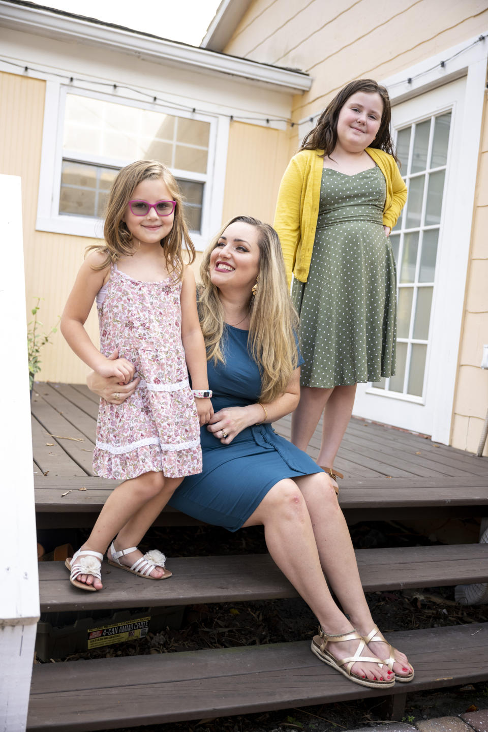 Jasmine Thorn and her daughters Gracie, right, and Jocelyn, left, at their home in St Petersburg, Fla., on Aug. 26, 2021. (Bob Croslin / for NBC News)