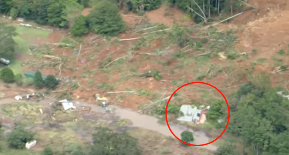 The house pictured collapsed into the creek after the landslide near Mullumbimby. Source: ABC