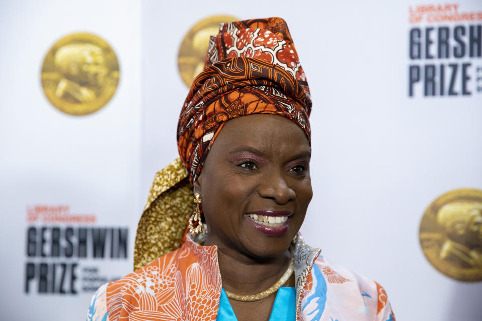 FILE - Angelique Kidjo arrives at the presentation of the Gershwin Prize, which honors a musician's lifetime contribution to popular music, hosted at DAR Constitution Hall in Washington on March 1, 2023. Kidjo is on this year’s Great Immigrants list announced Wednesday by the Carnegie Corporation of New York. (AP Photo/Amanda Andrade-Rhoades, File)