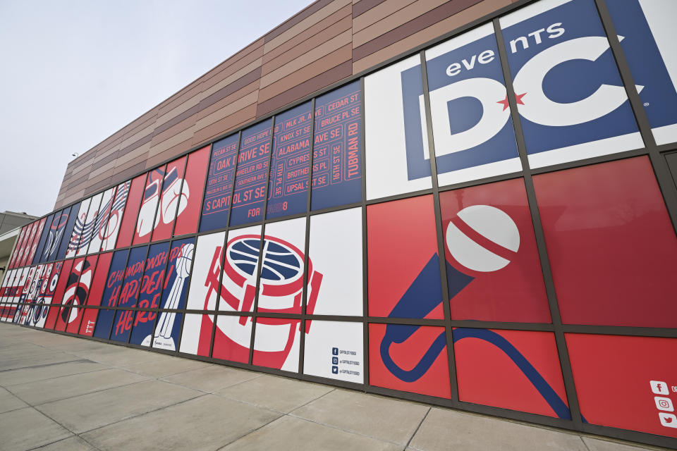 A mural is seen on the exterior of the Entertainment and Sports Arena, Friday, March 1, 2024, in Washington. The proposed move of the Capitals and Wizards sports teams to nearby Virginia has stoked concern in a pair of fragile Washington neighborhoods. (AP Photo/Terrance Williams)