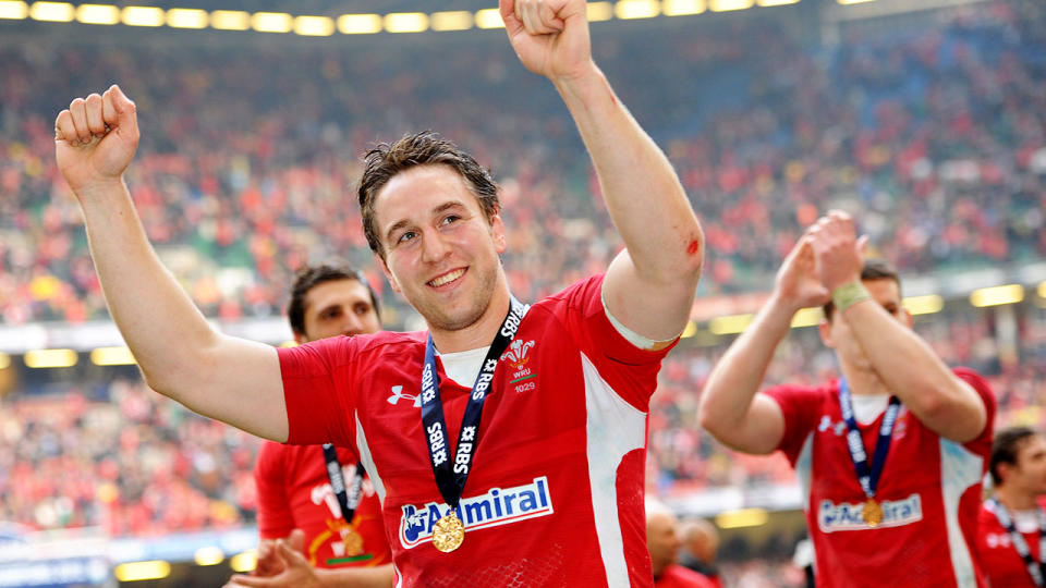 Pictured here, former Wales captain Ryan Jones celebrates a Six Nations triumph with his teammates.