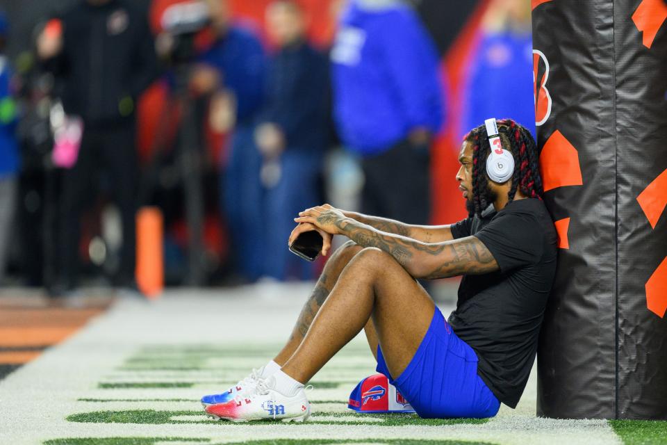 Buffalo Bills safety Damar Hamlin (3) warms up on the field before an NFL football game against the Cincinnati Bengals, Sunday, Nov. 5, 2023, in Cincinnati. (AP Photo/Zach Bolinger)