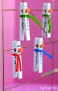 <p>These cute clips make kids' holiday artwork look even more adorable. </p><p><strong>Get the tutorial at <a href="https://www.easypeasyandfun.com/clothespin-snowman-craft/" rel="nofollow noopener" target="_blank" data-ylk="slk:Easy Peasy and Fun;elm:context_link;itc:0;sec:content-canvas" class="link ">Easy Peasy and Fun</a>.</strong></p><p><a class="link " href="https://www.amazon.com/Whitmor-Natural-Wood-Clothespins-100/dp/B002HRLL2U?tag=syn-yahoo-20&ascsubtag=%5Bartid%7C10050.g.22825300%5Bsrc%7Cyahoo-us" rel="nofollow noopener" target="_blank" data-ylk="slk:SHOP CLOTHESPINS;elm:context_link;itc:0;sec:content-canvas">SHOP CLOTHESPINS</a></p>
