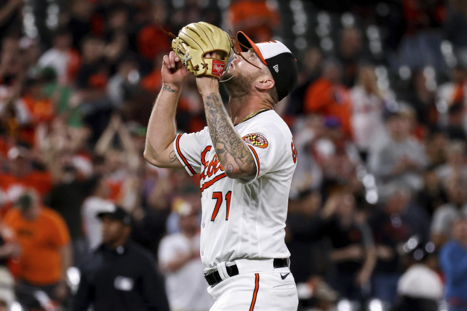 Baltimore Orioles relief pitcher Logan Gillaspie (71) reacts to defeating the Oakland Athletics in a baseball game, Tuesday, April 11, 2023, in Baltimore. The Orioles won 12-8. (AP Photo/Julia Nikhinson)