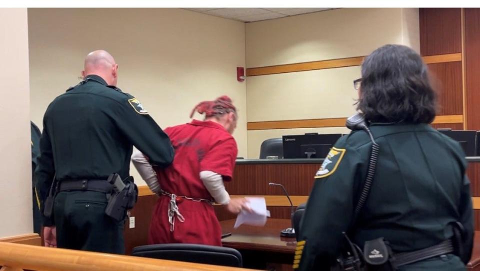 Ownership of Sheeba, an allegedly abused dog previously owned by Marcus Lynn Chiddister, 22,  above being re oved from the courtroom after an outburst, and his girlfriend, Kiara Howse, 23, was given to Lee County Sheriff Carmine Marceno after a civil hearing Thursday.