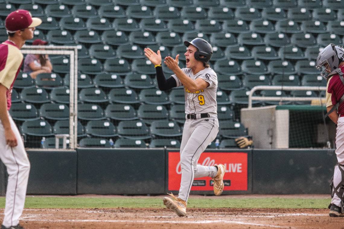 Sunset’s Miguel Gonzalez claps after scoring a run in the second inning on Friday in a Class 4A state semifinal against Citra North Marion at Hammond Stadium in Fort Myers. Jarrett Guthrie/Jarrett Guthrie/813 Preps