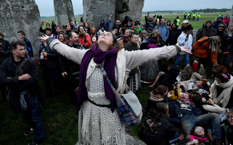 Crowds gather to celebrate the Summer Solstice at Stonehenge on June 21 2021 - Toby Melville/Reuters