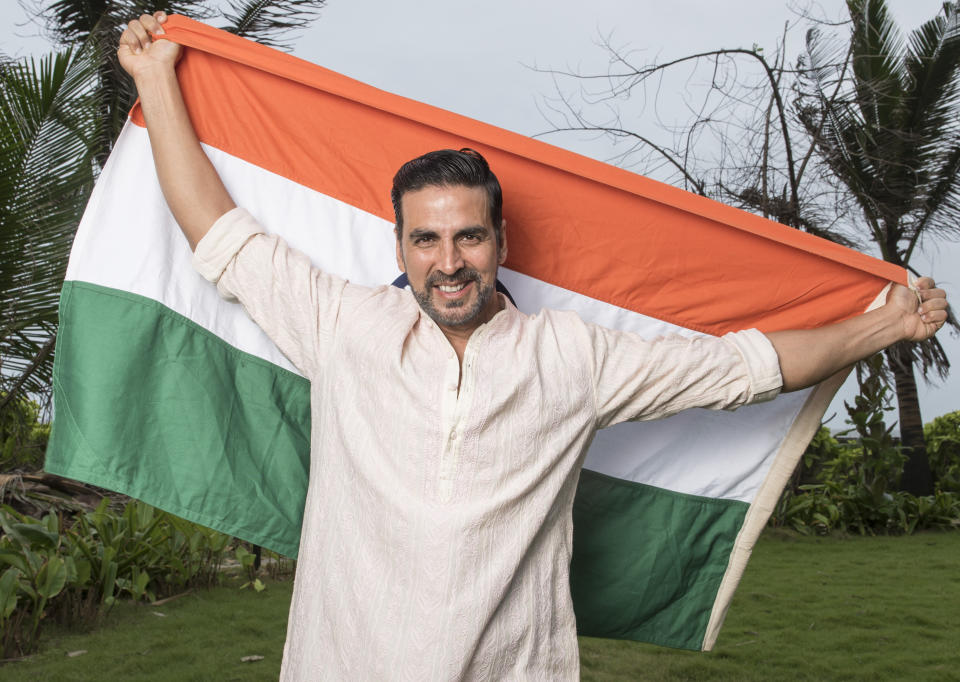 MUMBAI, INDIA - AUGUST 10: Bollywood actor Akshay Kumar poses with Indian flag for Independence Day shoot, on August 10, 2016 in Mumbai, India. (Photo by Aalok Soni/ Hindustan Times via Getty Images)