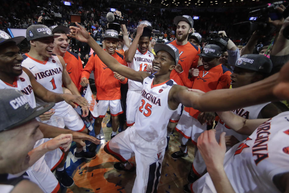 Virginia won its third conference title Saturday night, and looks to be the top team in the NCAA tournament. (AP Photo/Julie Jacobson)