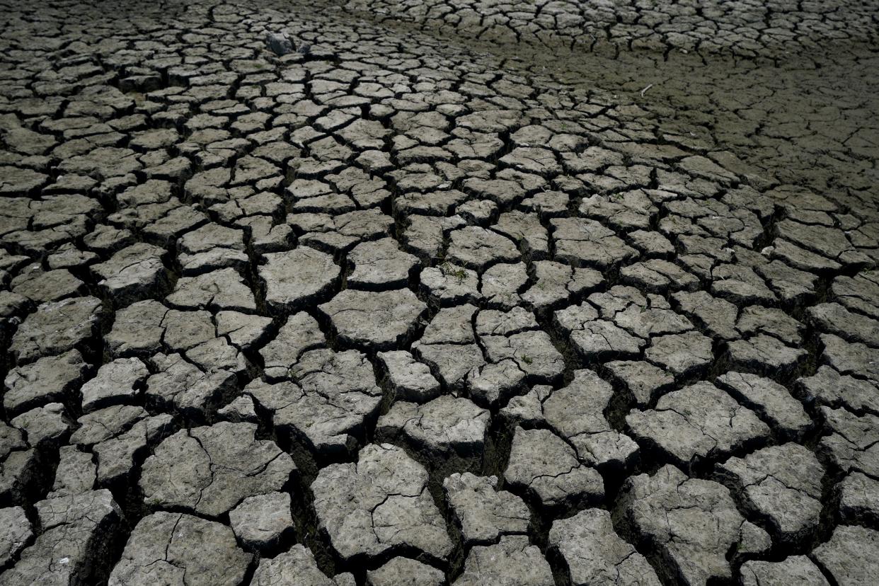 Dry, cracked land is visible in The Boca reservoir that supplies water to the northern city of Monterrey during a drought in Santiago, Mexico, July 9, 2022.